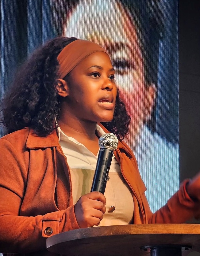 An entrepreneur pitching on stage during the Shark Tank competition